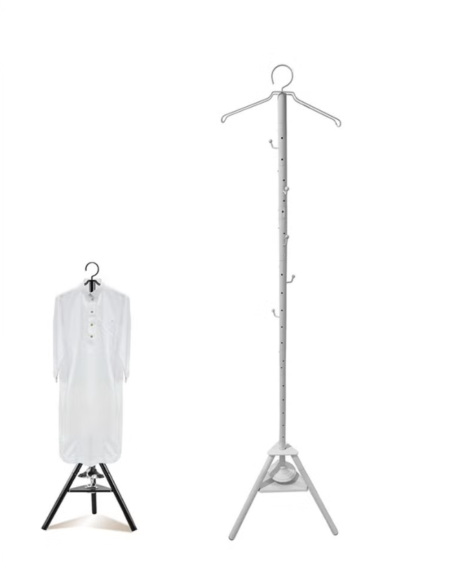 حامل مبخرة لتبخير الملابس على شكل شماعة.  Incense burner stand for steaming clothes in the form of a hanger